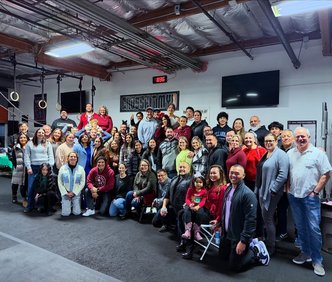 CrossFit MYO community celebrating together at a holiday party